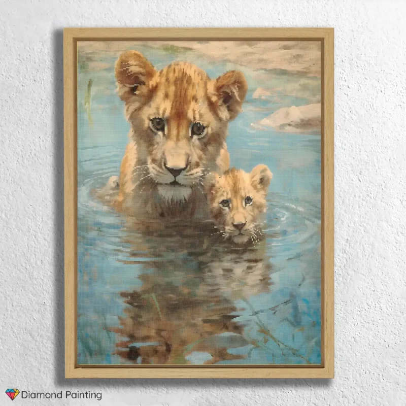 Cuccioli di leone nell'acqua